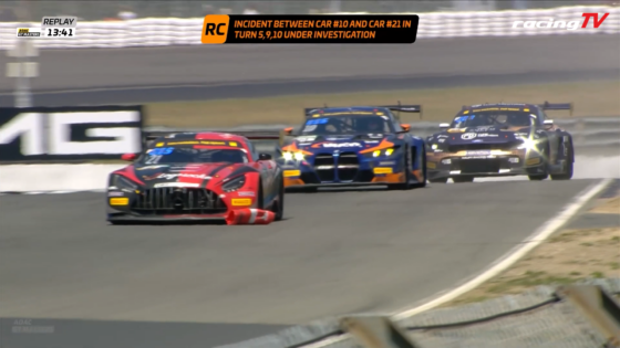 Three GT race cars chase along a track, led by a red car, with blue and dark cars behind; RacingTV header visible top right.