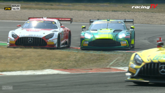 Two race cars cornering on a track: a red-and-white Mercedes on the left and a lime-green Aston Martin on the right.